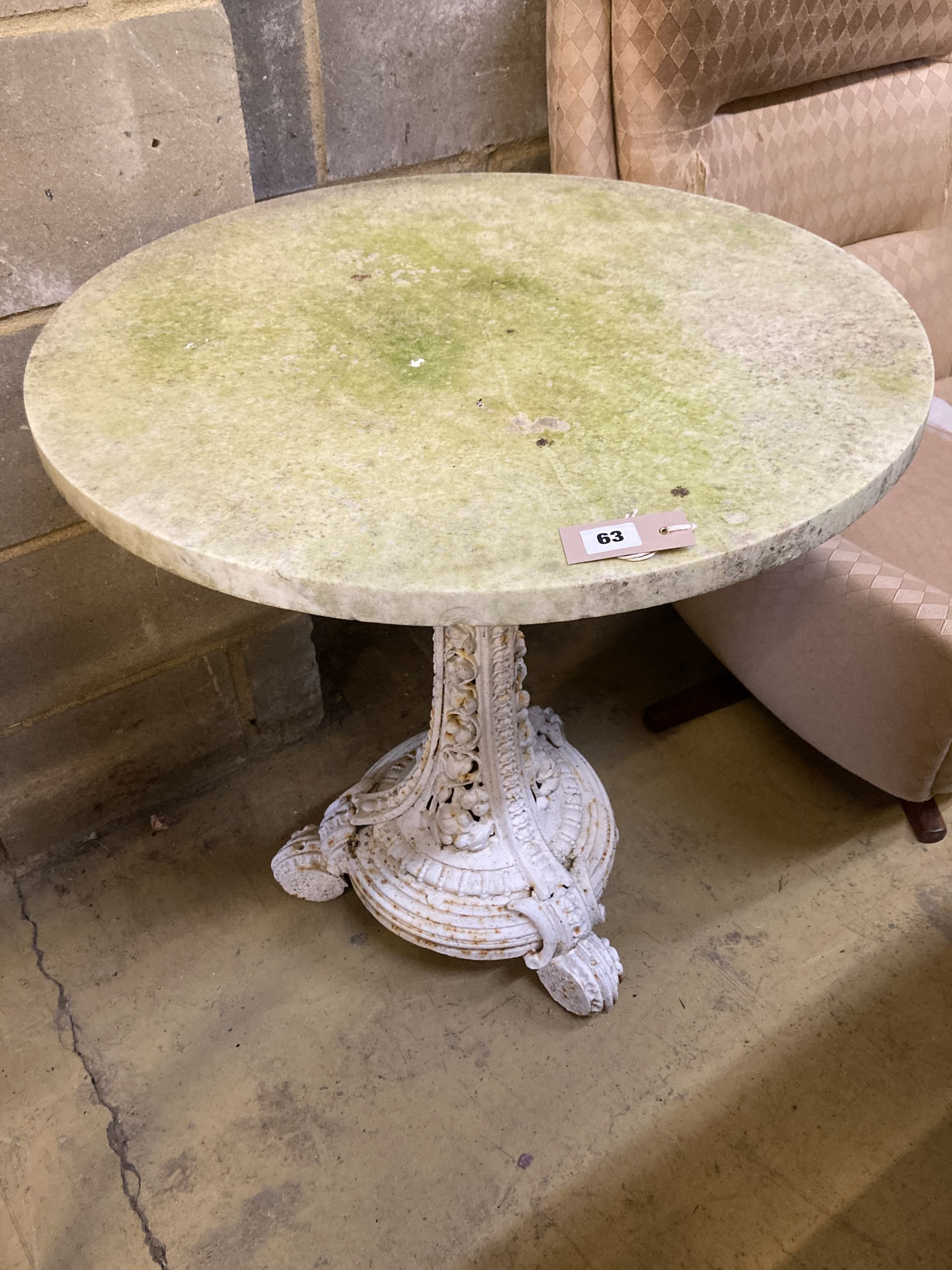 A Coalbrookdale white painted cast iron wine table with later white marble top, 66cm diameter, height 77cm